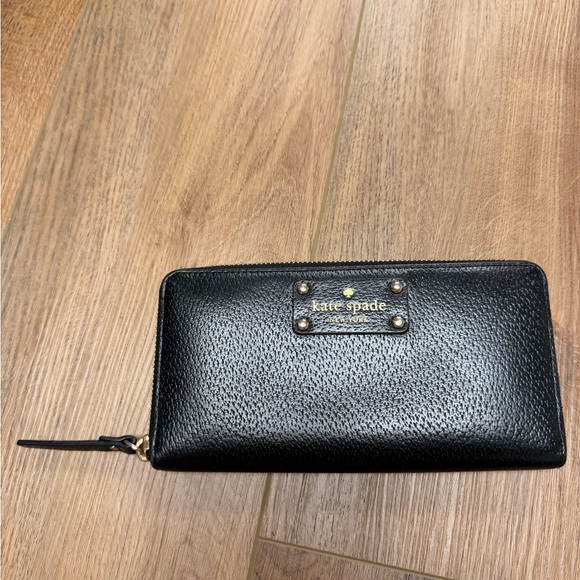 kate spade Handbags - Kate Spade NY Black Leather Zip-Around Wallet with Gold Accent + Pink Interior